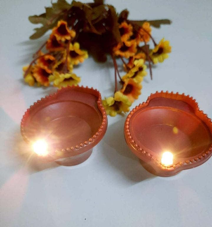 Water Sensor Flameless Led Floating Tealight diya candle Candle (Brown, Pack of 6)_BZ_Water sencer led candle