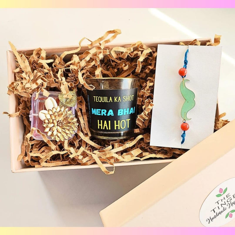 THE TINGE Tequila ka Shot Vanilla Bourn Bourn Scented Hand Poured Candle with Rakhi and Roli Chawal Rakshabandhan Gift Hamper Box for Brother Sister