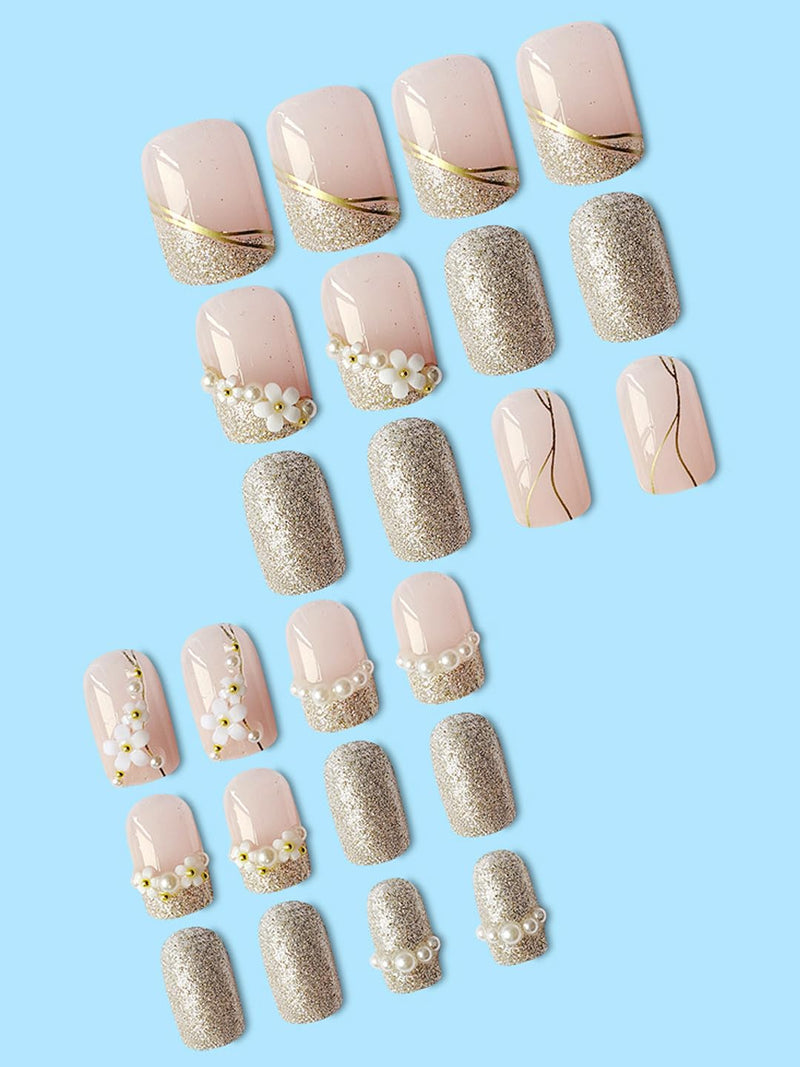 Secret Lives acrylic fake reusable false artifical press on nails translucent pink color with silverish golden glitter 3D flowers and pearl design 24 pieces with kit